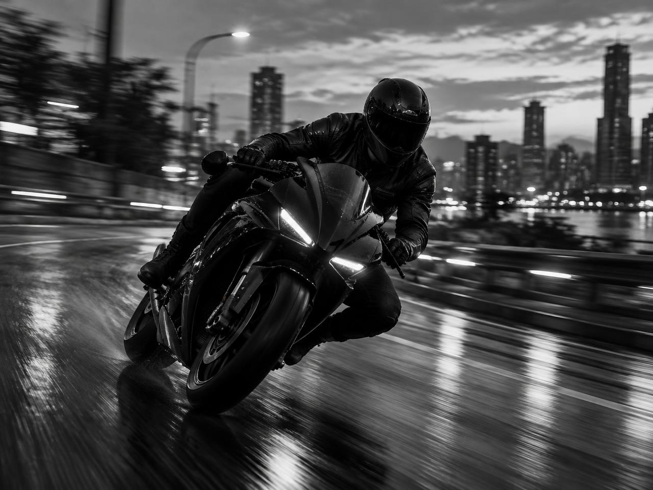 Rider on a wet city road
